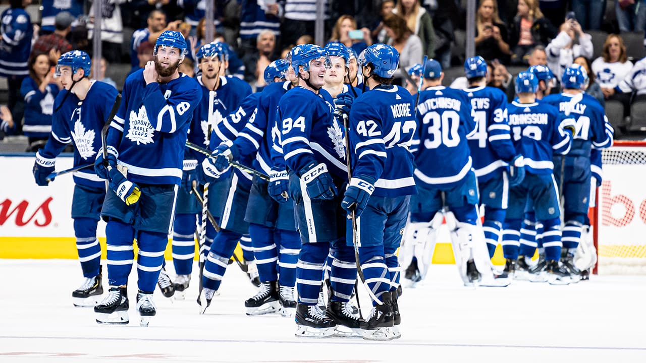Toronto Maple Leafs players celebrating a goal
